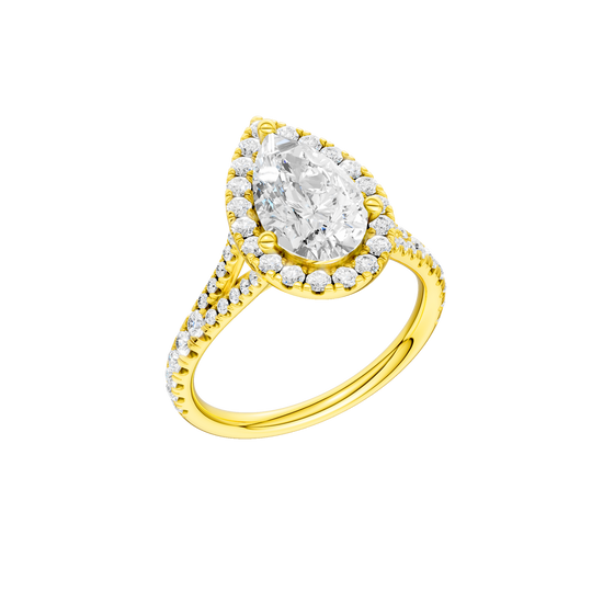 A three-quarter view of the Pear cut diamond engagement ring in 14k yellow gold with a prong band and solitaire setting