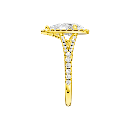 A side view of the Pear cut diamond engagement ring in 14k yellow gold with a prong band and solitaire setting