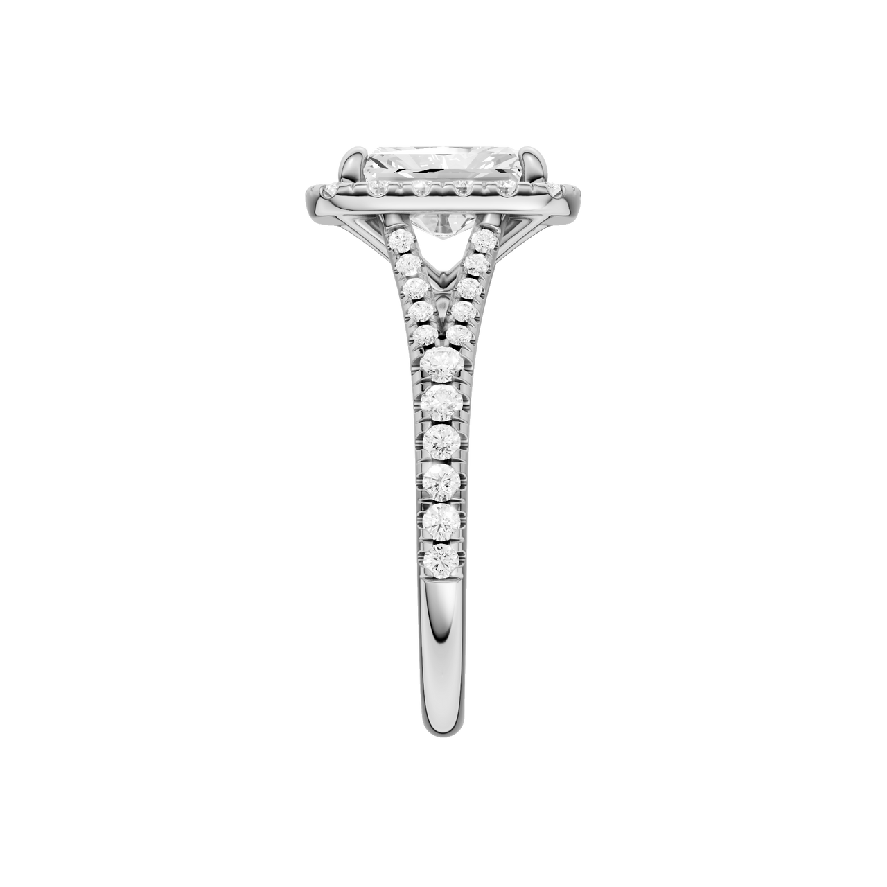 A side view of the Radiant cut diamond engagement ring in 14k white gold with a diamond band and halo setting