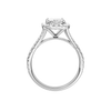 A profile view of the Radiant cut diamond engagement ring in platinum with a diamond band and halo setting