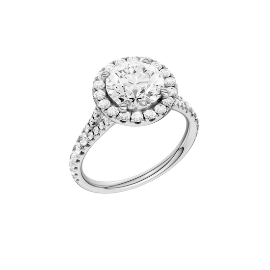 A three-quarter view of the Round cut diamond engagement ring in 14k white gold with a prong diamond band and split setting