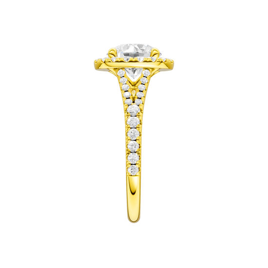 A side view of the Round cut diamond engagement ring in 14k yellow gold with a prong diamond band and split setting