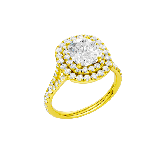 A three-quarter view of the Elongated cushion cut diamond engagement ring in 14k yellow gold with a prong diamond band and split setting