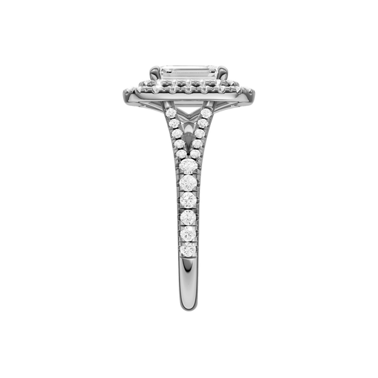A side view of the Emerald cut diamond engagement ring in 14k white gold with a prong diamond band and split setting