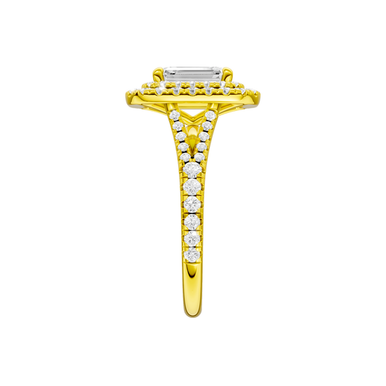 A side view of the Emerald cut diamond engagement ring in 14k yellow gold with a prong diamond band and split setting