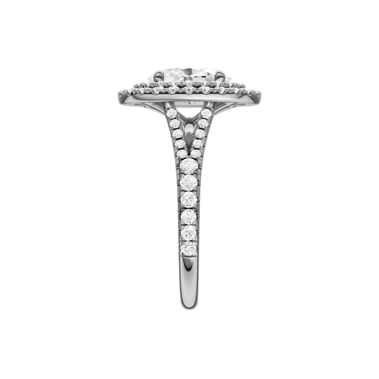 A side view of the Oval cut diamond engagement ring in 14k white gold with a prong diamond band and split setting