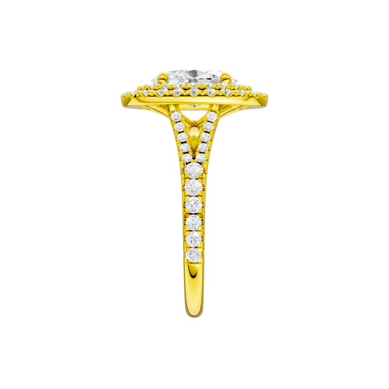 A side view of the Oval cut diamond engagement ring in 14k yellow gold with a prong diamond band and split setting