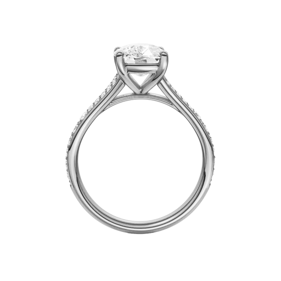 A profile view of the Elongated cushion cut diamond engagement ring in 14k white gold with a diamond channel band and split setting