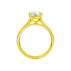A profile view of the Elongated cushion cut diamond engagement ring in 14k yellow gold with a diamond channel band and split setting