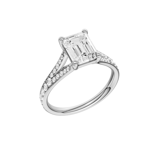 A three-quarter view of the Emerald cut diamond engagement ring in 14k white gold with a diamond channel band and split setting