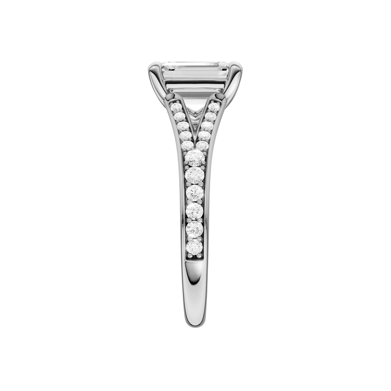 A side view of the Emerald cut diamond engagement ring in platinum with a diamond channel band and split setting