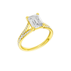A three-quarter view of the Emerald cut diamond engagement ring in 14k yellow gold with a diamond channel band and split setting