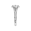 A side view of the Oval cut diamond engagement ring in platinum with a diamond channel band and split setting