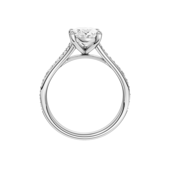 A profile view of the Oval cut diamond engagement ring in 14k white gold with a diamond channel band and split setting