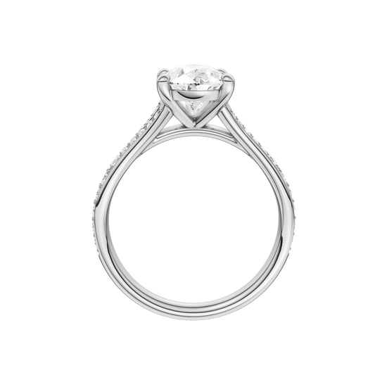 A profile view of the Pear cut diamond engagement ring in 14k white gold with a diamond channel band and split setting