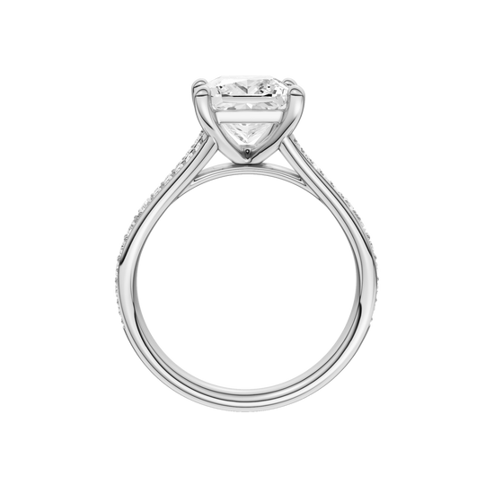 A profile view of the Princess cut diamond engagement ring in 14k white gold with a diamond channel band and split setting