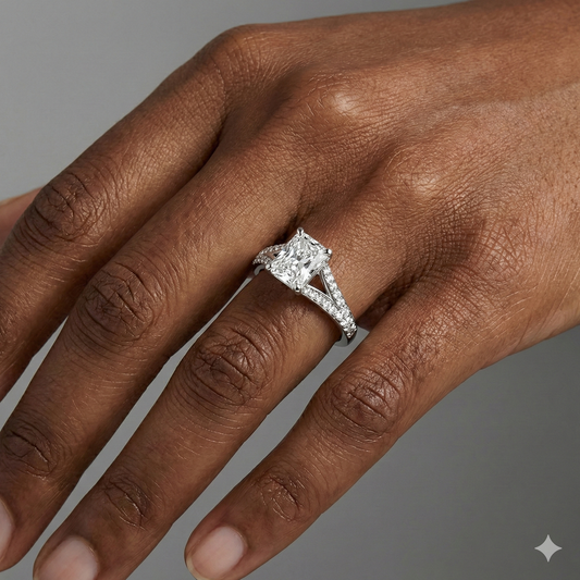 Radiant cut diamond engagement ring in 14k white gold with a diamond channel band and split setting on a hand