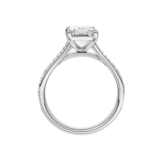 A profile view of the Radiant cut diamond engagement ring in 14k white gold with a diamond channel band and split setting