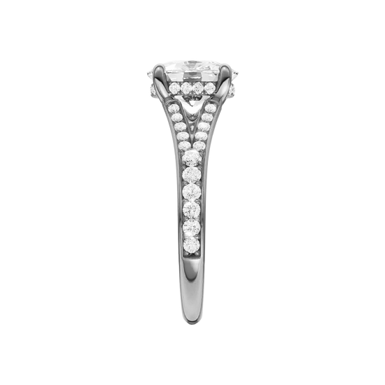 A side view of the Elongated Cushion cut diamond engagement ring in 14k white gold  with a channel band and hidden halo setting