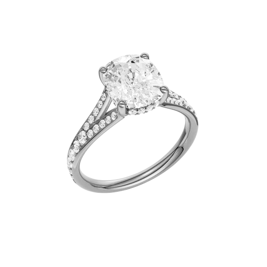 A three-quarter view of the Elongated Cushion cut diamond engagement ring in platinum  with a channel band and hidden halo setting
