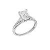 A three-quarter  view of the Emerald cut diamond engagement ring in 14k platinum with a diamond channel band and split setting