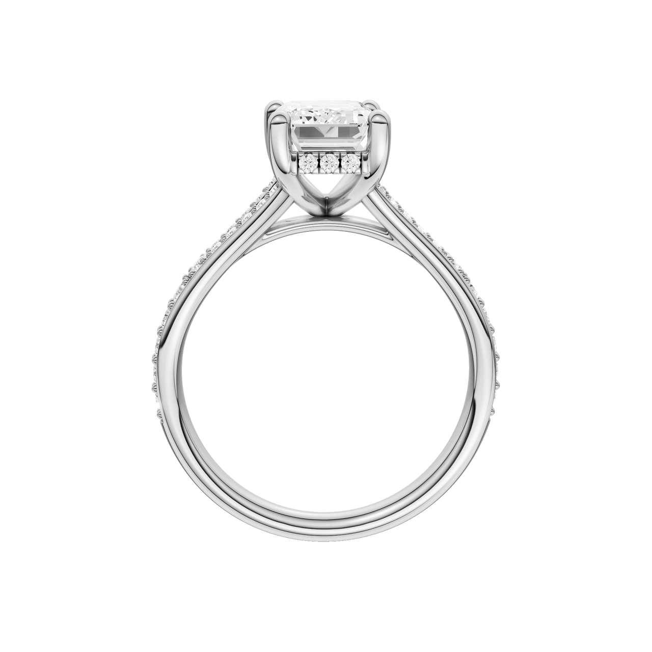 A profile view of the Emerald cut diamond engagement ring in 14k platinum with a diamond channel band and split setting