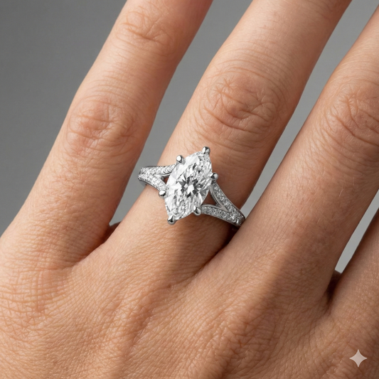 Marquise cut diamond engagement ring in 14k white gold with a diamond channel band and split setting on a hand