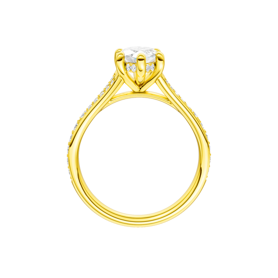 A profile view of the Marquise cut diamond engagement ring in 14k yellow gold with a diamond channel band and split setting