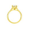 A profile view of the Marquise cut diamond engagement ring in 14k yellow gold with a diamond channel band and split setting