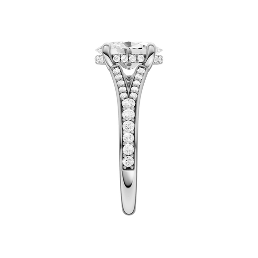 A side view of the Oval cut diamond engagement ring in 14k white gold with a channel band and hidden halo setting