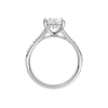 A profile view of the Oval cut diamond engagement ring in 14k white gold with a channel band and hidden halo setting