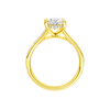 A profile view of the Oval cut diamond engagement ring in 14k yellow gold with a channel band and hidden halo setting