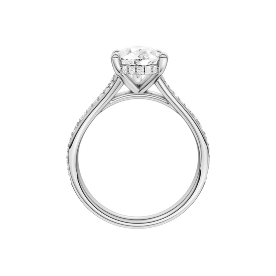 A profile view of the Pear cut diamond engagement ring in platinum with a channel band and cathedral setting