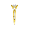A side view of the Princess cut diamond engagement ring in 14k yellow gold with a diamond channel band and split setting