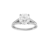 A front view of the Round cut diamond engagement ring in platinum gold with a channel band and hidden halo setting