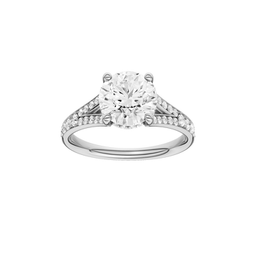 A front view of the Round cut diamond engagement ring in 14k white gold with a channel band and hidden halo setting