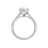A profile view of the Round cut diamond engagement ring in 14k white gold with a channel band and hidden halo setting
