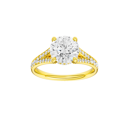 A front view of the Round cut diamond engagement ring in 14k yellow gold with a channel band and hidden halo setting