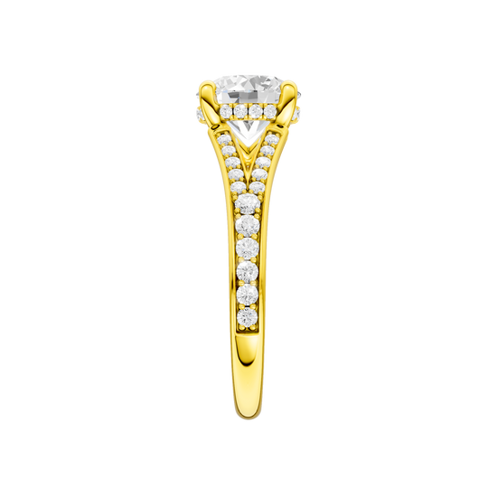 A side view of the Round cut diamond engagement ring in 14k yellow gold with a channel band and hidden halo setting