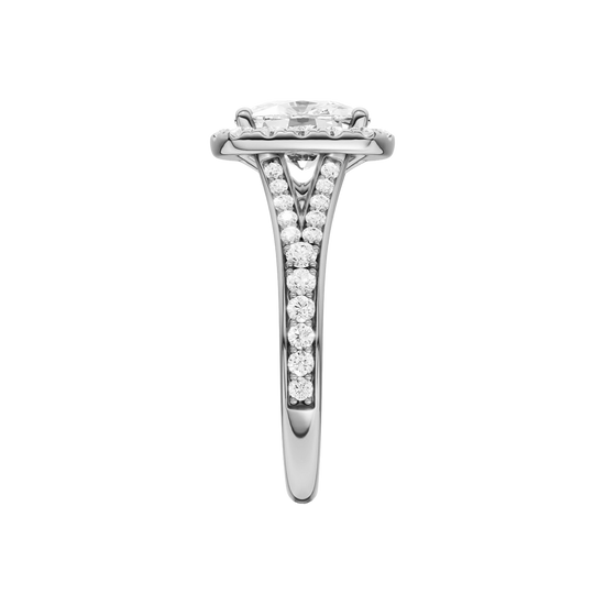 A side view of the Elongated cushion cut diamond engagement ring in platinum with a diamond channel band and split setting