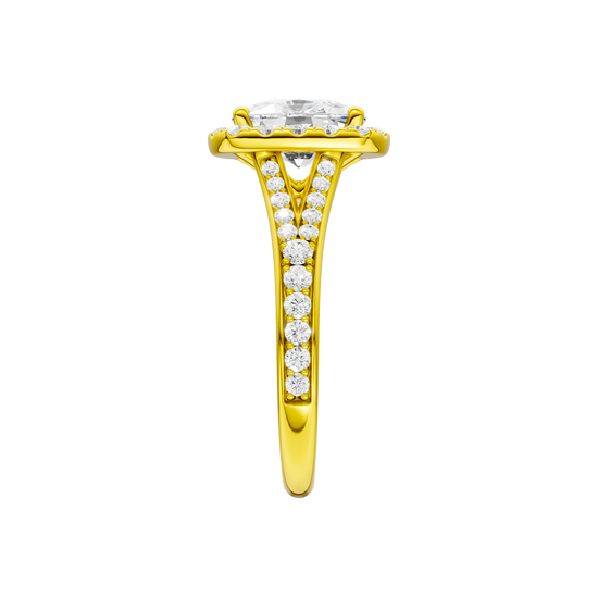 A side view of the Elongated cushion cut diamond engagement ring in 14k yellow gold with a diamond channel band and split setting