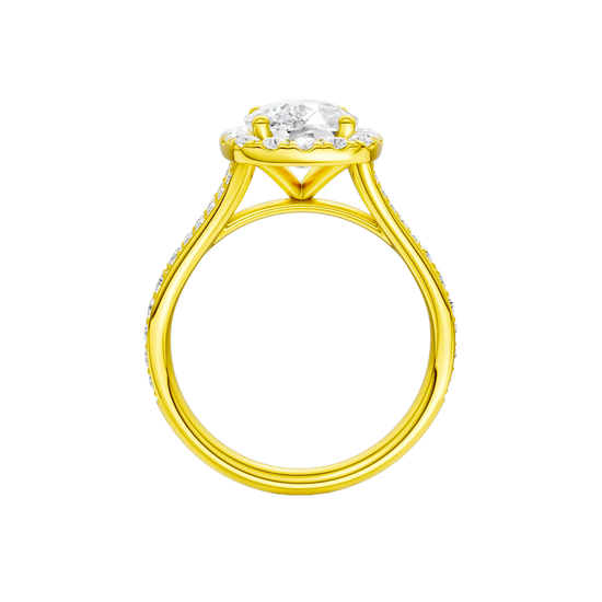 A profile view of the Elongated cushion cut diamond engagement ring in 14k yellow gold with a diamond channel band and split setting