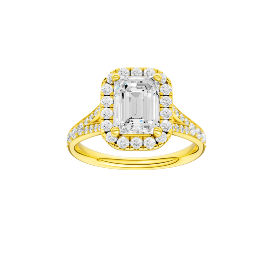 A front view of the Emerald cut diamond engagement ring in 14k yellow gold with a diamond channel band and split setting