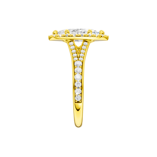 A side view of the Marquise cut diamond engagement ring in 14k yellow gold with a channel band and solitaire setting