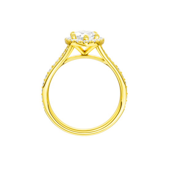 A profile view of the Marquise cut diamond engagement ring in 14k yellow gold with a channel band and solitaire setting