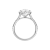 A profile view of the Pear cut diamond engagement ring in platinum with a diamond channel band and split setting