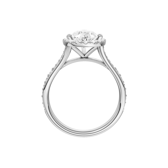 A profile view of the Pear cut diamond engagement ring in 14k white gold with a diamond channel band and split setting