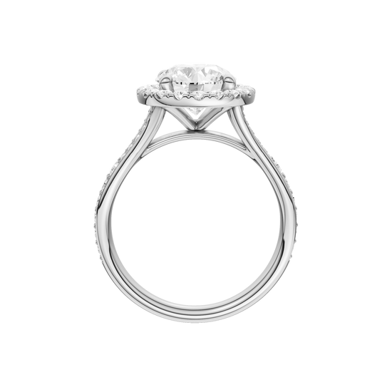 A profile view of the Round cut diamond engagement ring in platinum with a diamond channel band and split setting