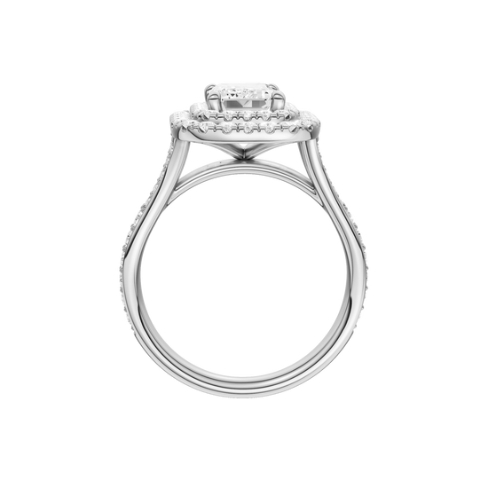 A profile view of the Emerald cut diamond engagement ring in 14k white gold with a channel band and double halo setting