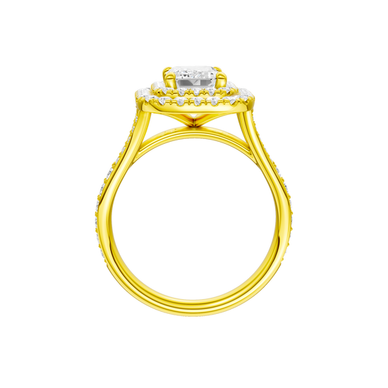 A profile view of the Emerald cut diamond engagement ring in 14k yellow gold with a channel band and double halo setting